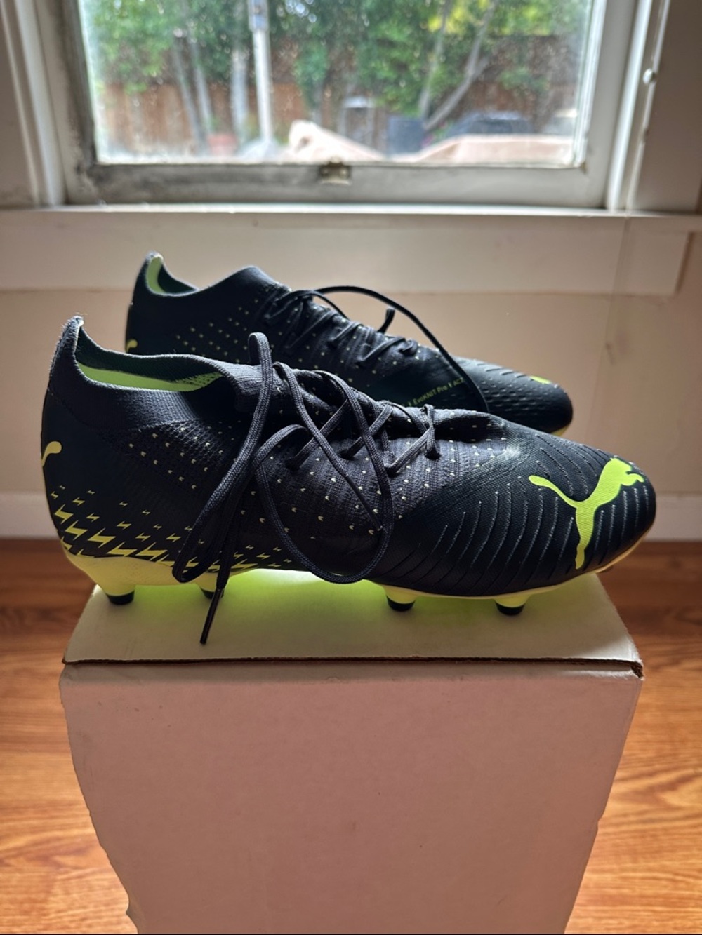 Puma Men’s Black and Neon Green Athletic Soccer Cleats